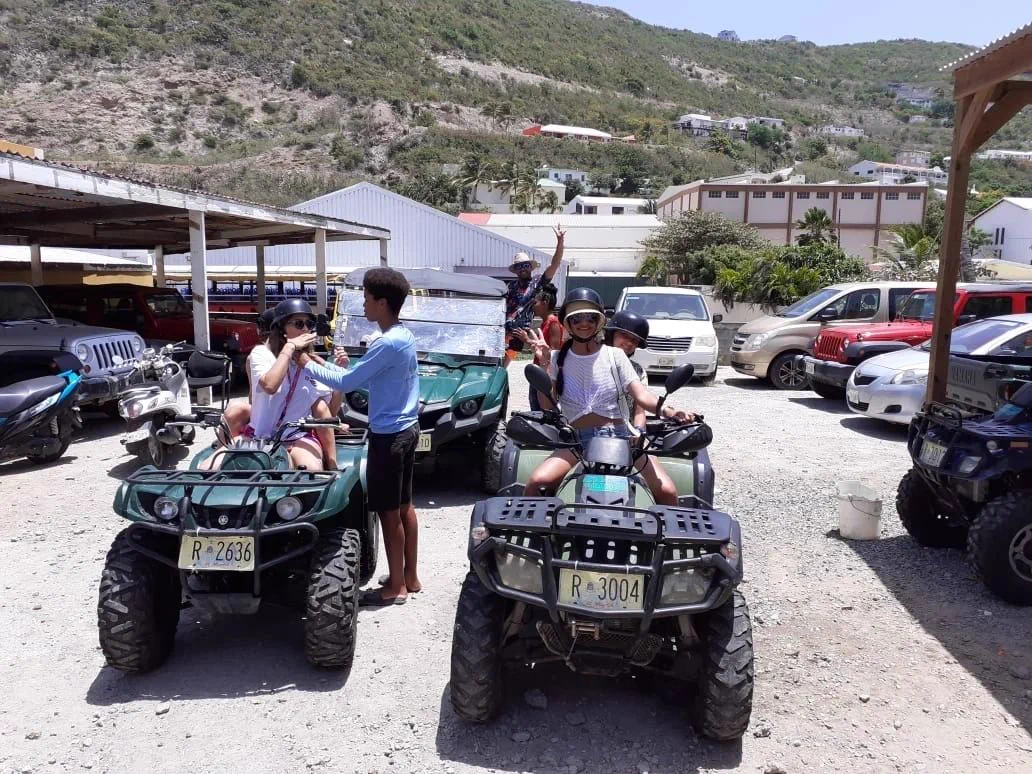 Guests ready to depart on ATV Island quads