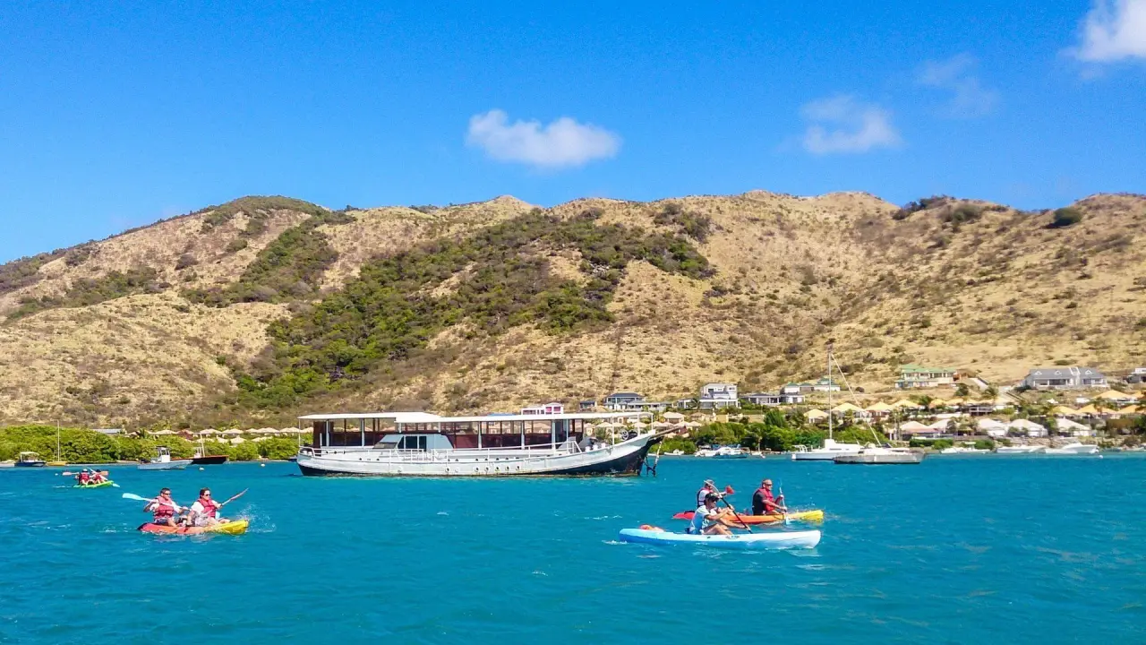 Guided kayak group with Caribbean Paddling toward Pinel Island