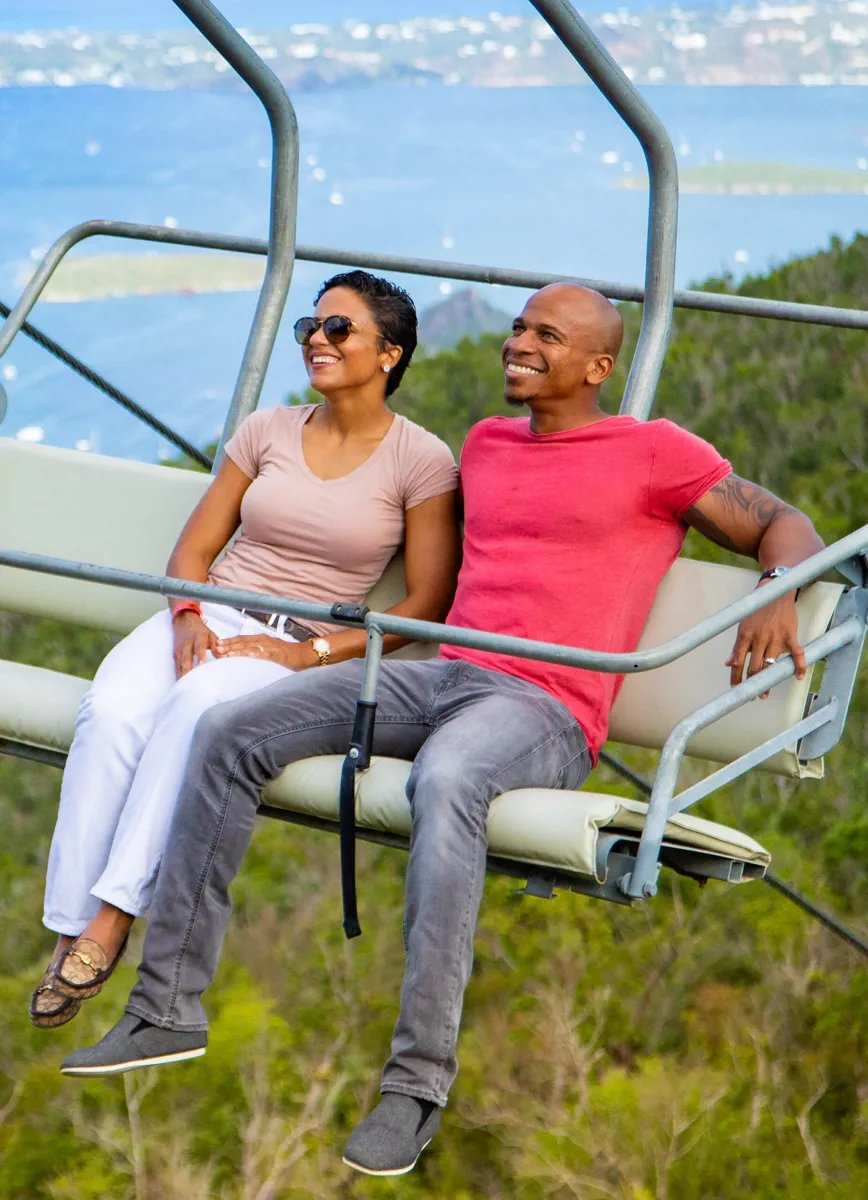 Guests riding the Sky Explorer chairlift at Rainforest Adventures St Maarten