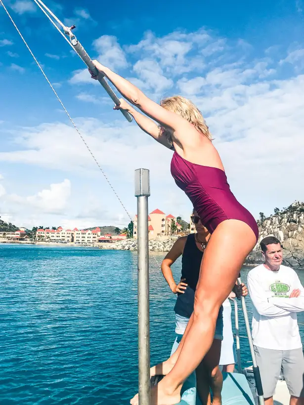 Random Wind Charters Tarzan swing during a catamaran outing