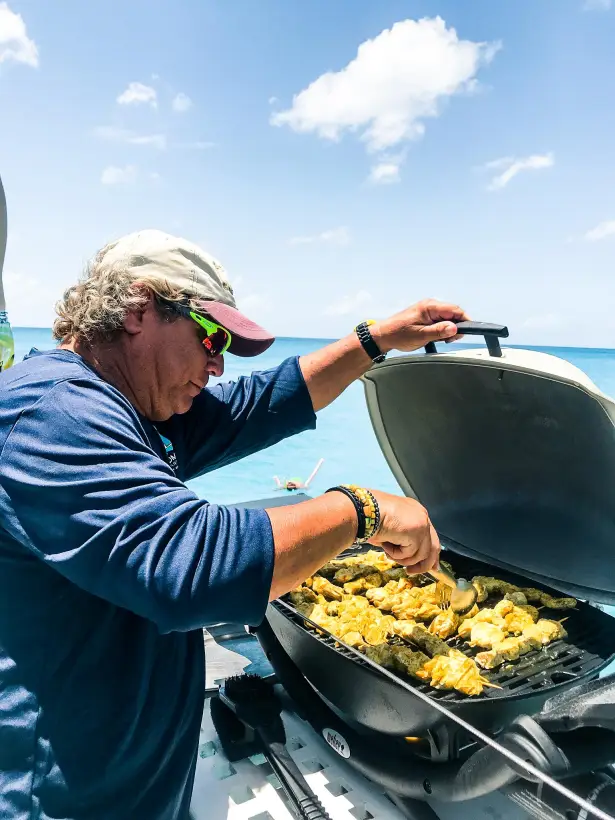 Grilled lunch prepared on board the Random Wind Charters catamaran