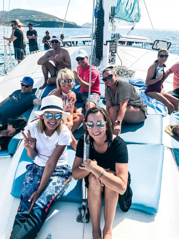 Group of guests on the deck of the Random Wind Charters catamaran