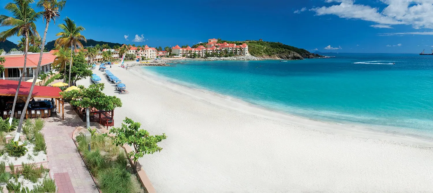White-sand beach and beach restaurants at Divi Little Bay
