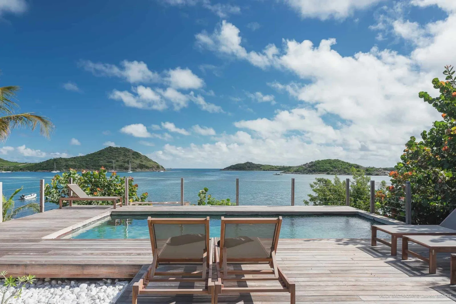 Wooden deck and pool at Villa Baltazar with sea view