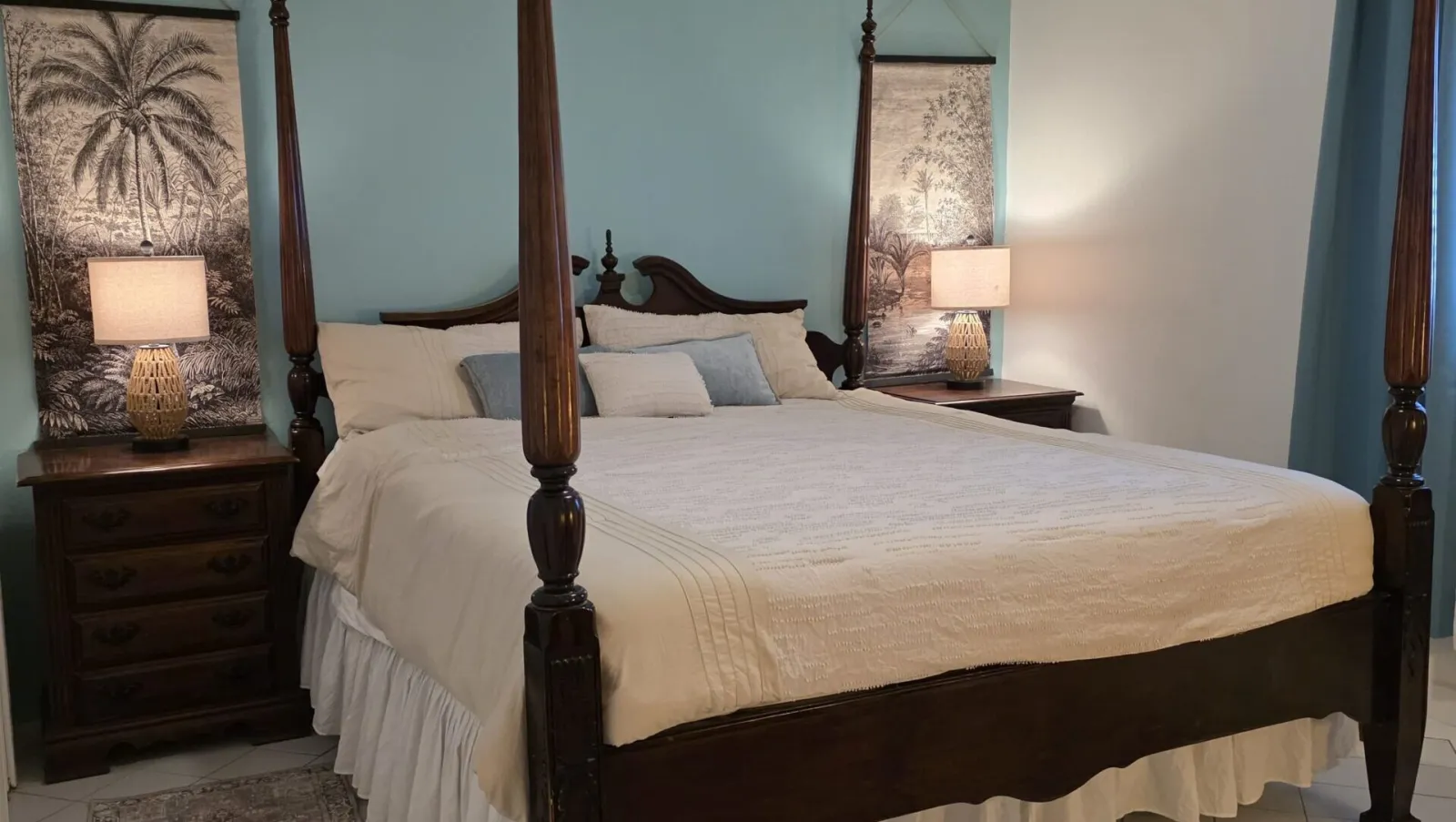 King room with four-poster bed at Mary's Boon