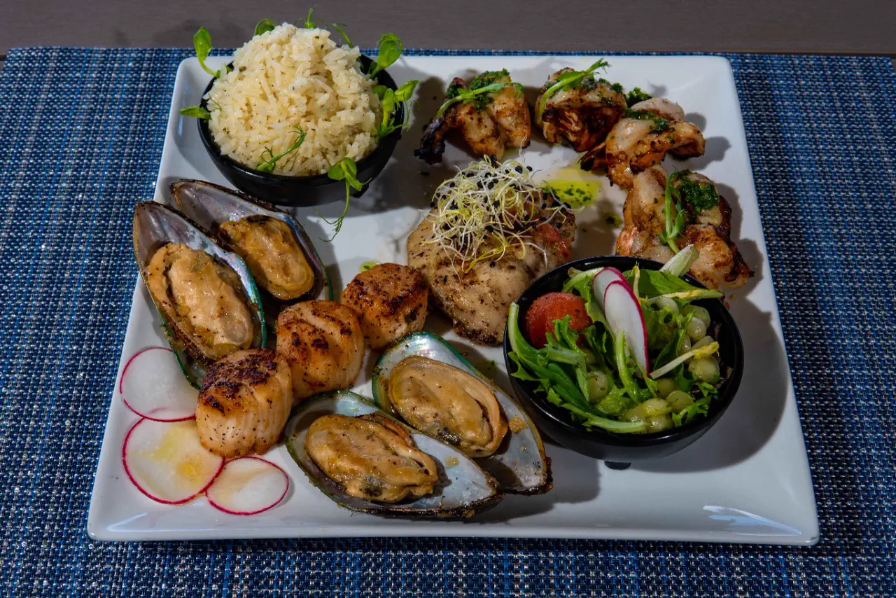 Astra - Seafood plate with shellfish, fish and rice in Simpson Bay