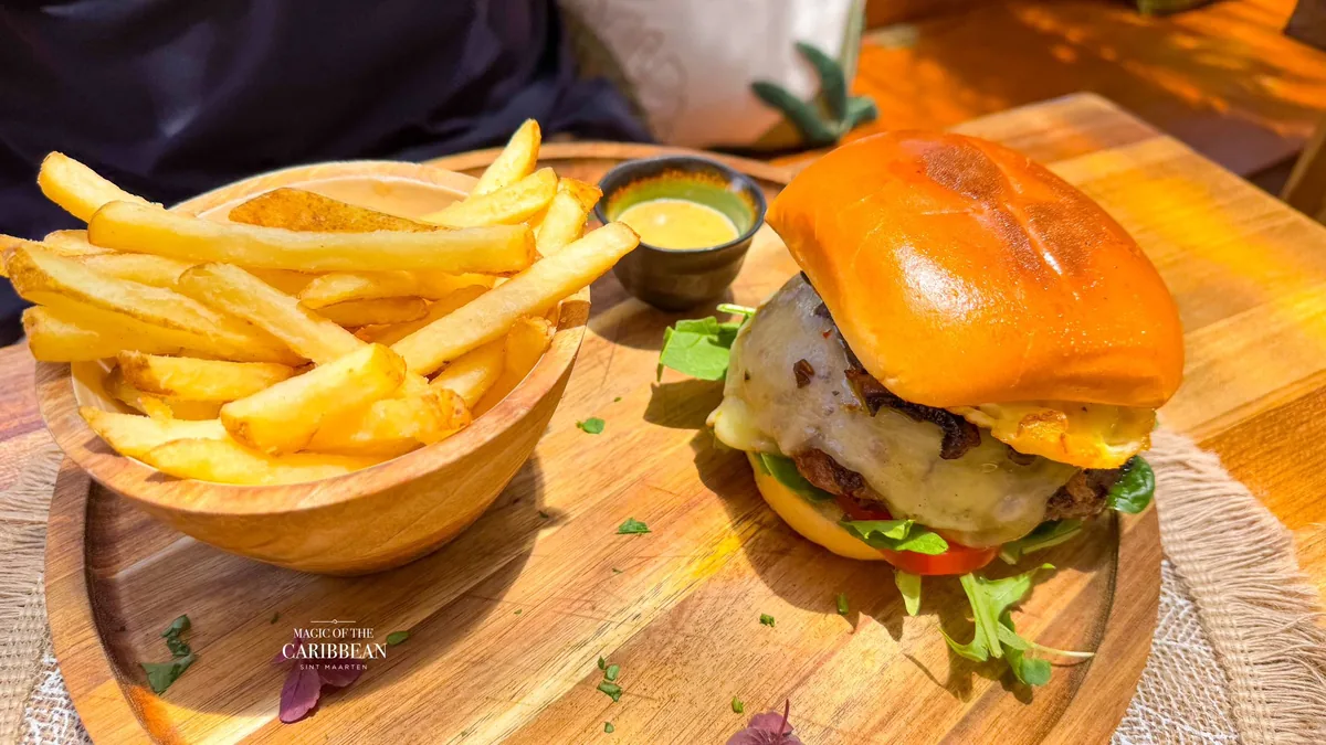 Baratié SXM smash burger with house fries and honey-mustard sauce