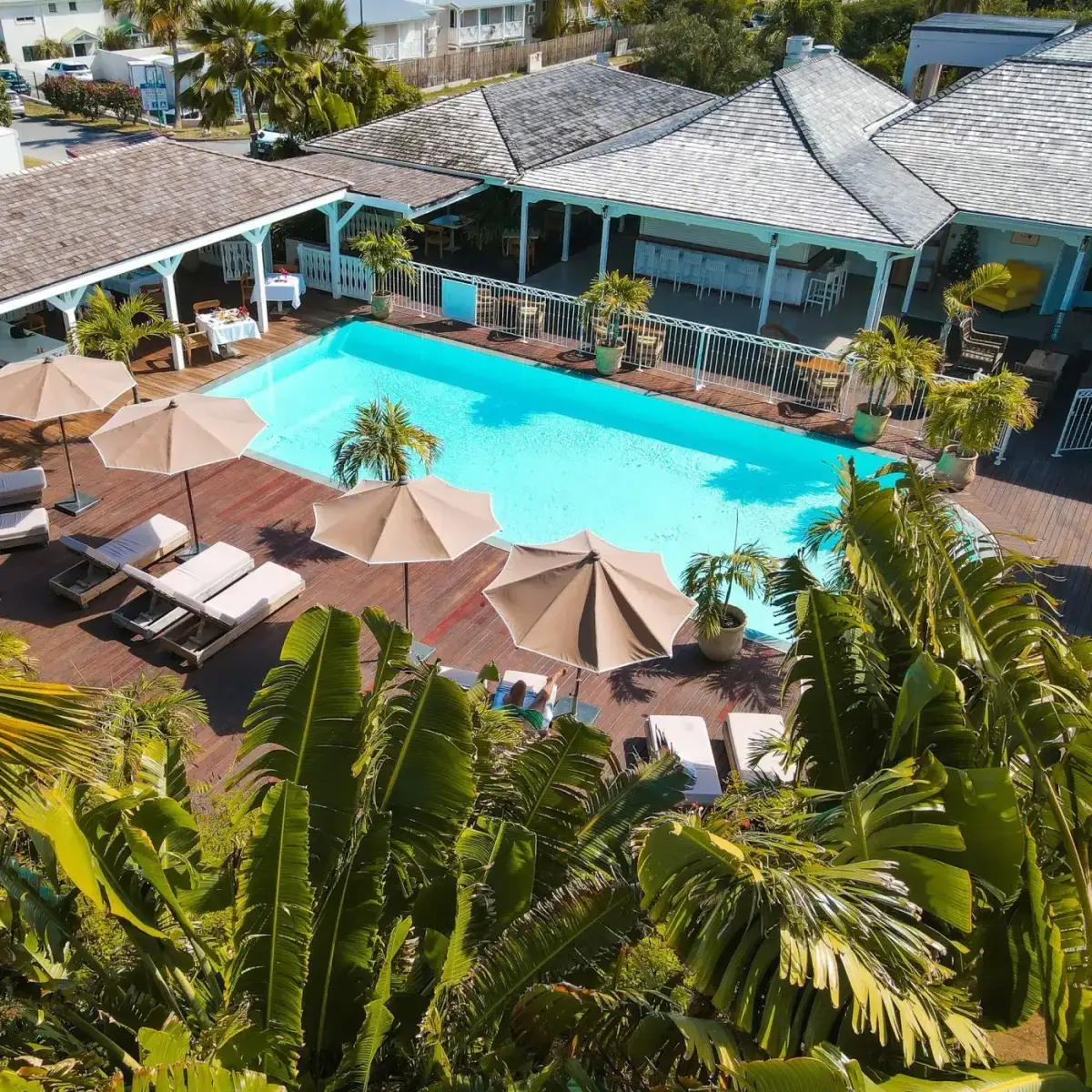 Bikini Beach - pool surrounded by sunbeds aerial view of the beach club
