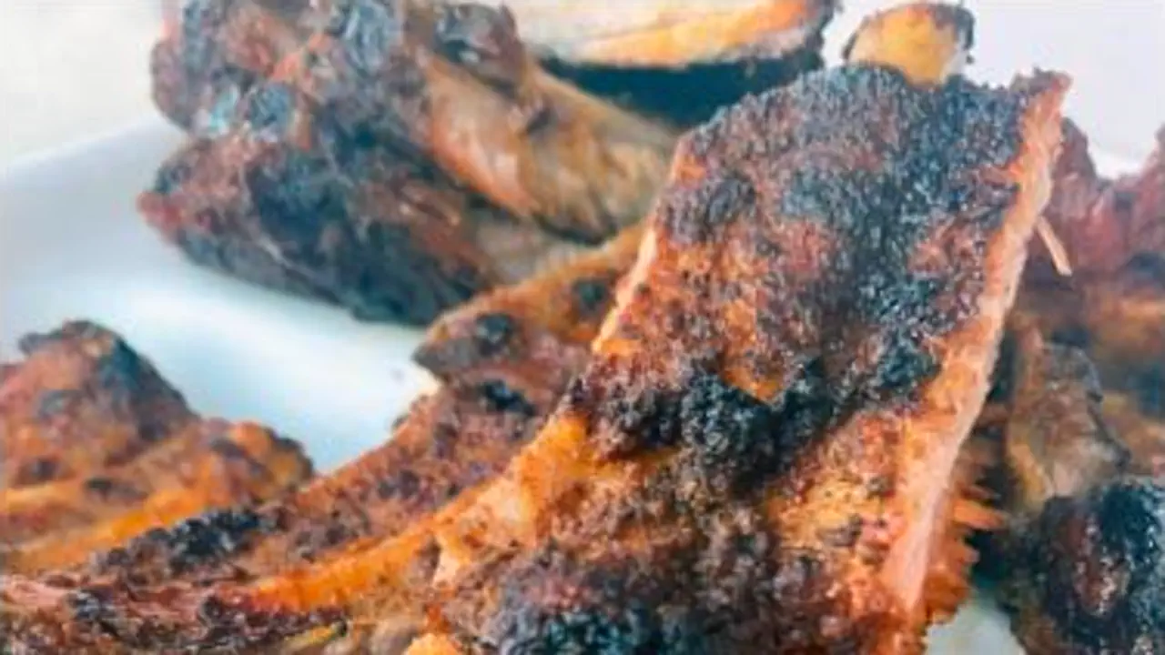Captain’s Rib Shack - Grilled BBQ ribs covered with sauce