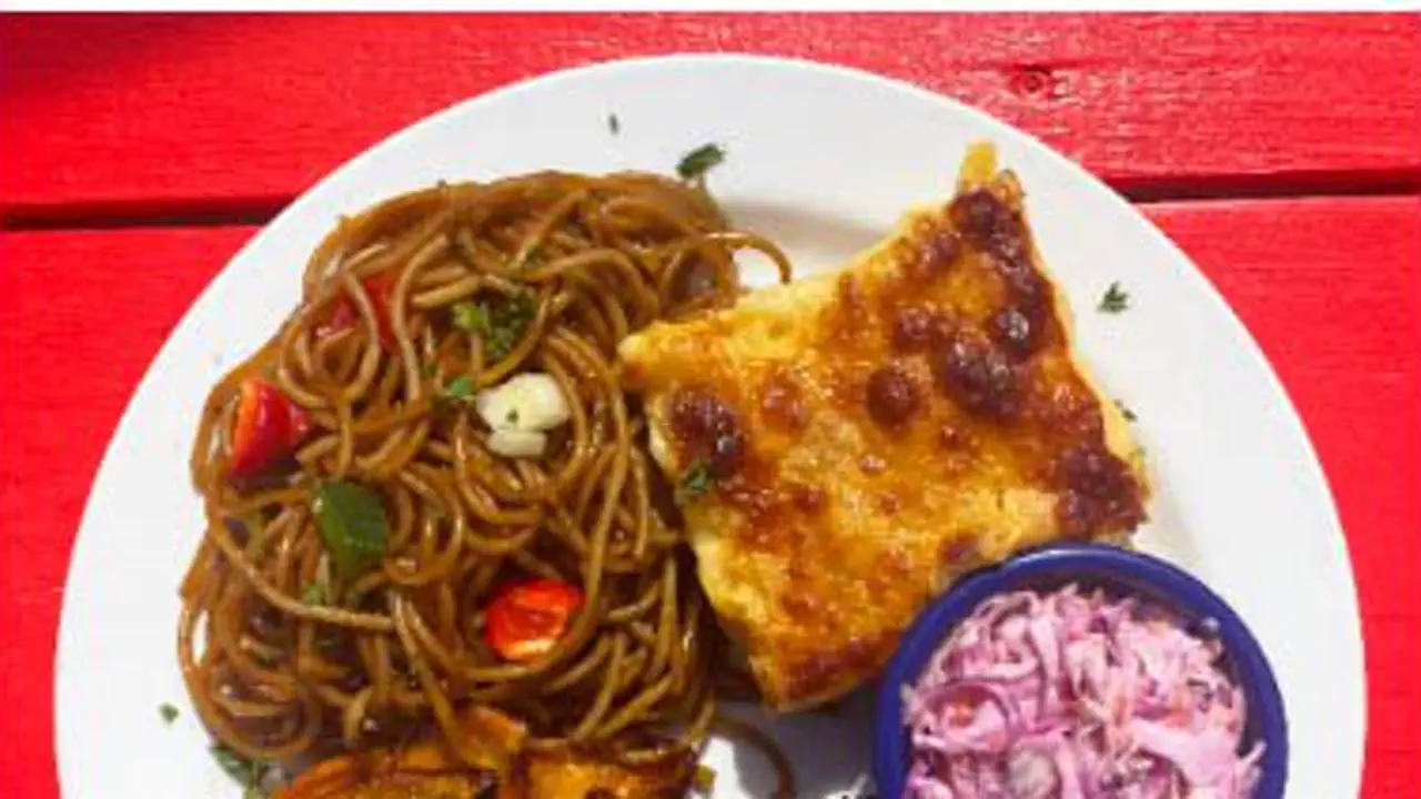 Captain’s Rib Shack - Local plate with bami noodles and sides
