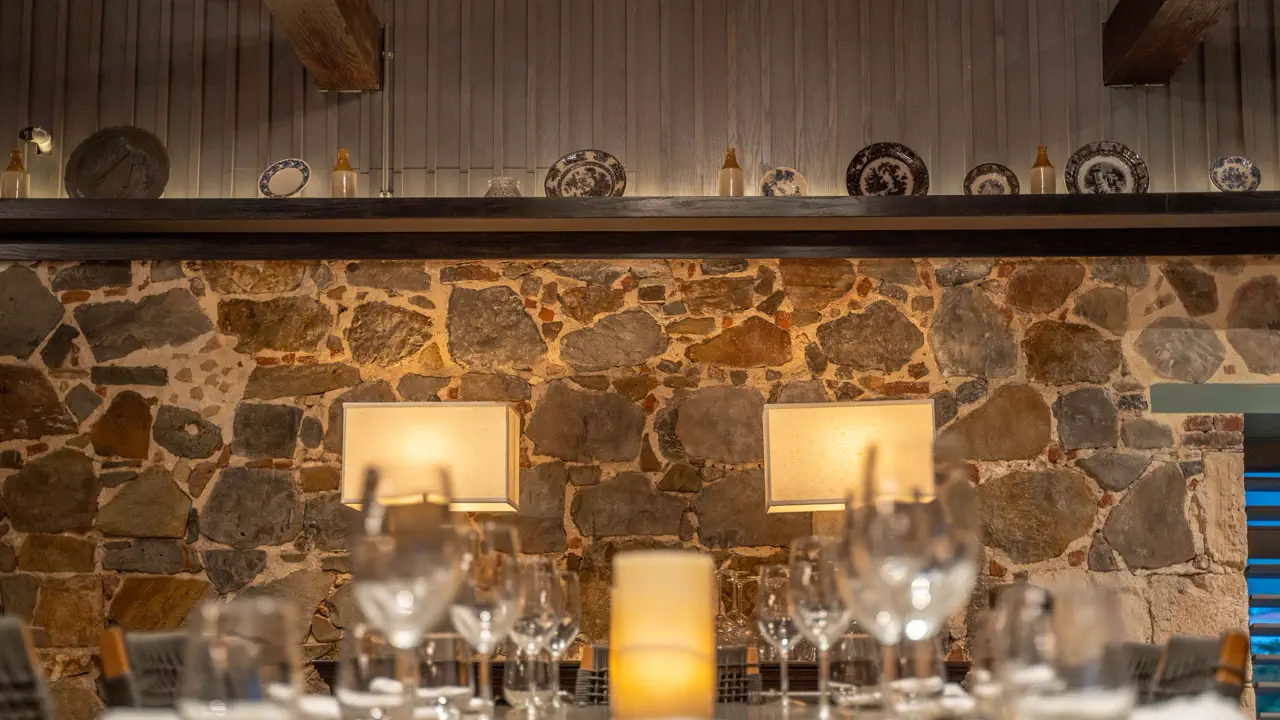 Emilio's - Stone wall detail and decor inside the former sugar estate building