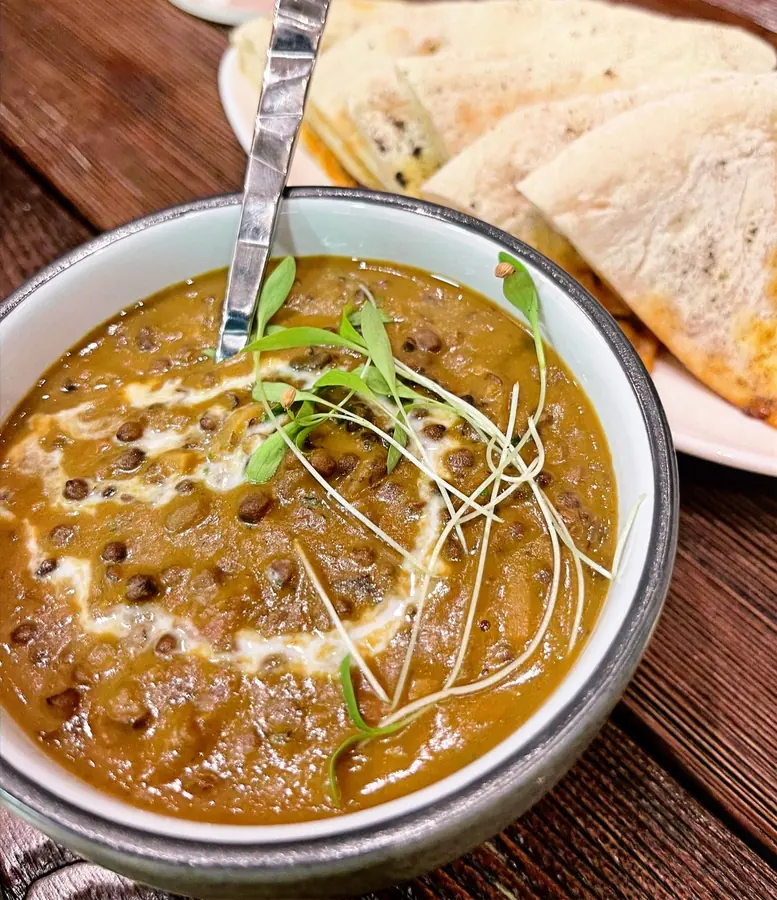 Jai's Contemporary Fusion Cuisine - Indian curry served with naan