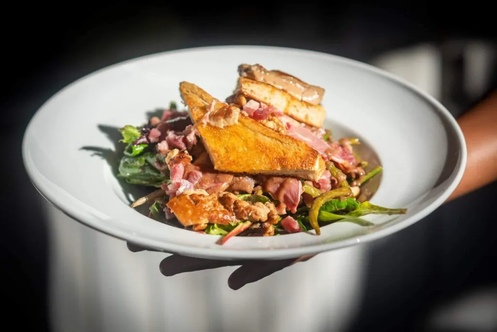 Karakter - gourmet salad with foie gras served at the beach club