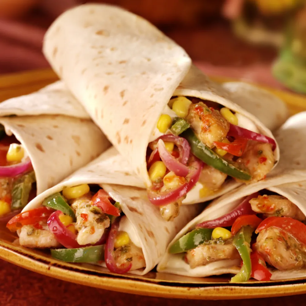 La Favela - fajitas served in a hot skillet with peppers