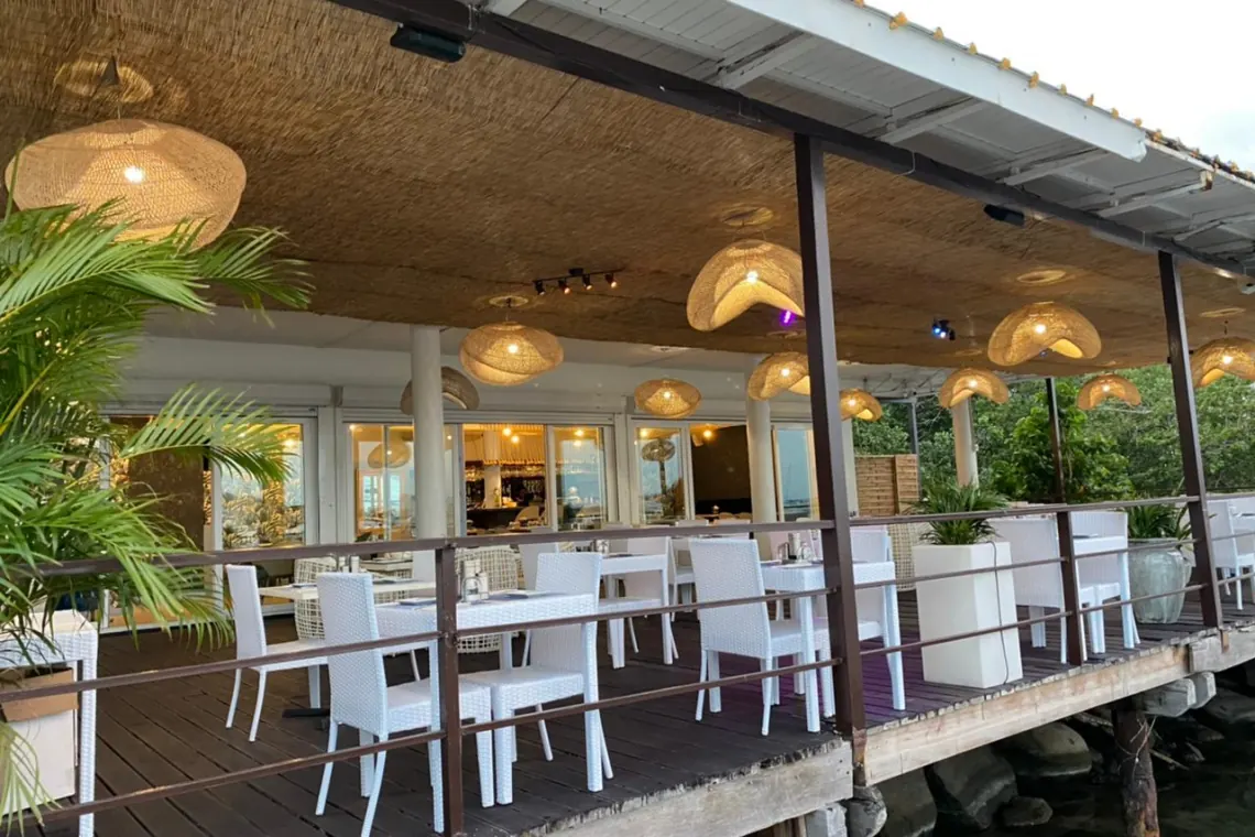 Outdoor terrace of La Perle Bleu in Cole Bay by the Simpson Bay Lagoon