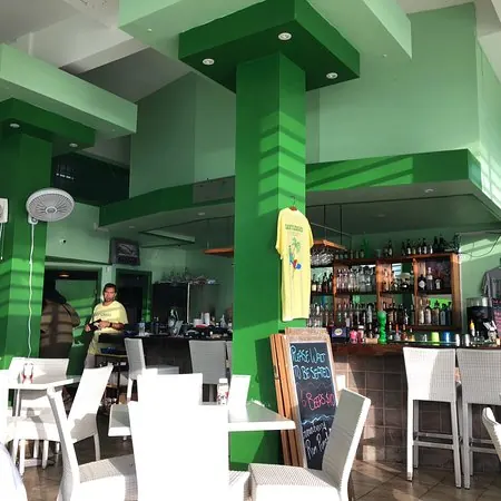 Lazy Lizard - open dining room and green indoor bar