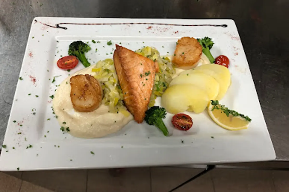Fish and scallop plate served at Le Grand St Martin