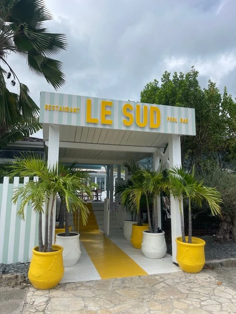 Exterior entrance of Le Sud restaurant and pool bar in Orient Bay