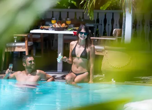 Daytime pool atmosphere at Le Sud restaurant at La Plantation