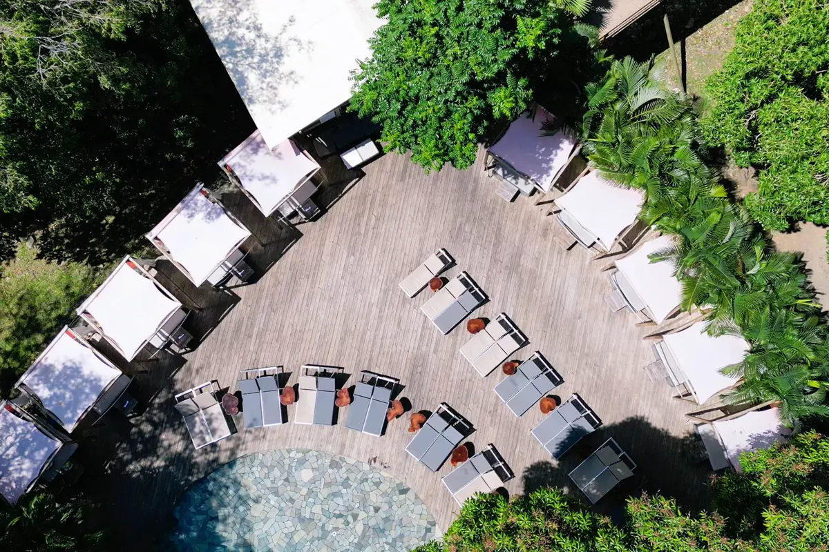 Loterie Farm in Saint Martin - pool terrace and cabanas in the forest