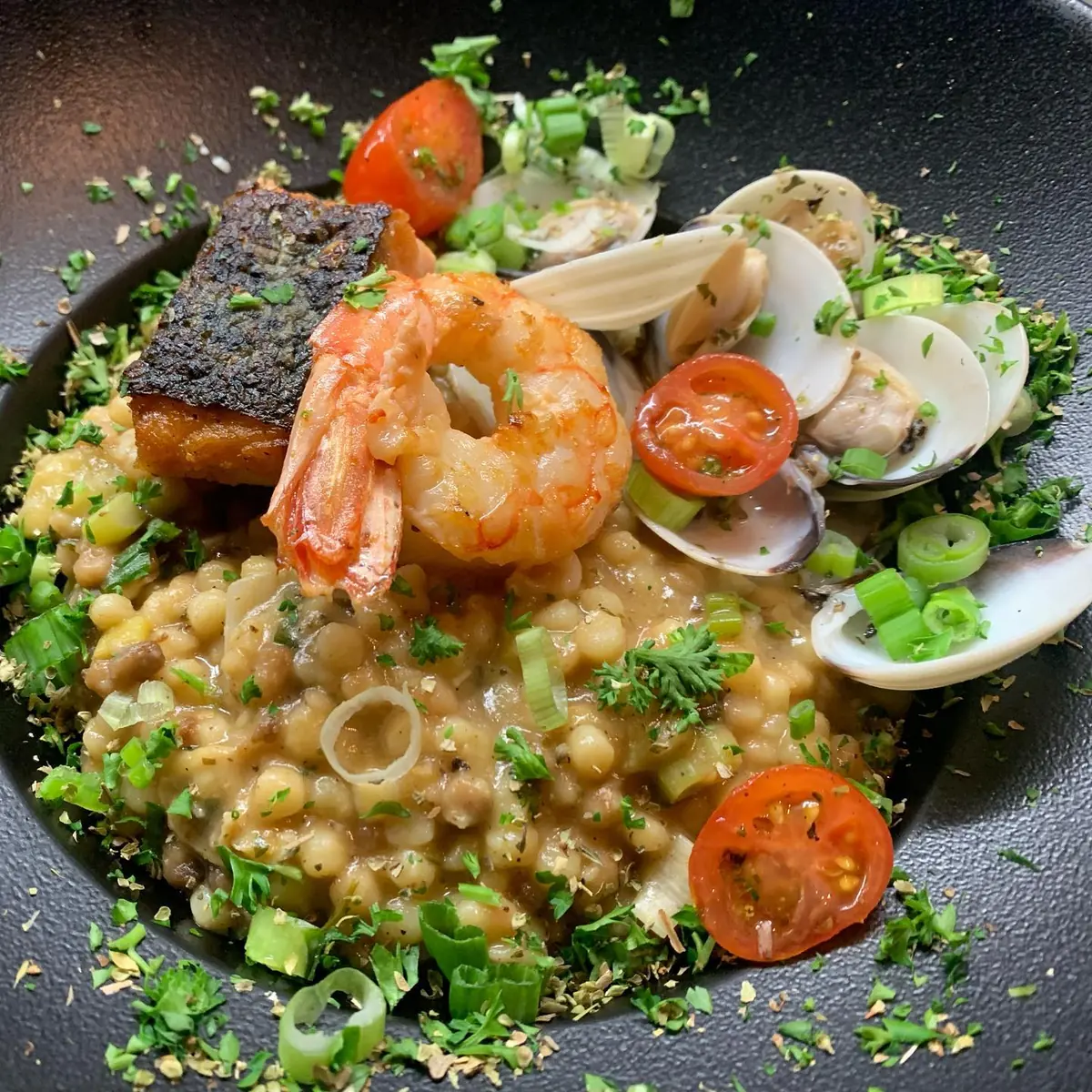 Seafood risotto with shrimp and shellfish at Mezza Luna