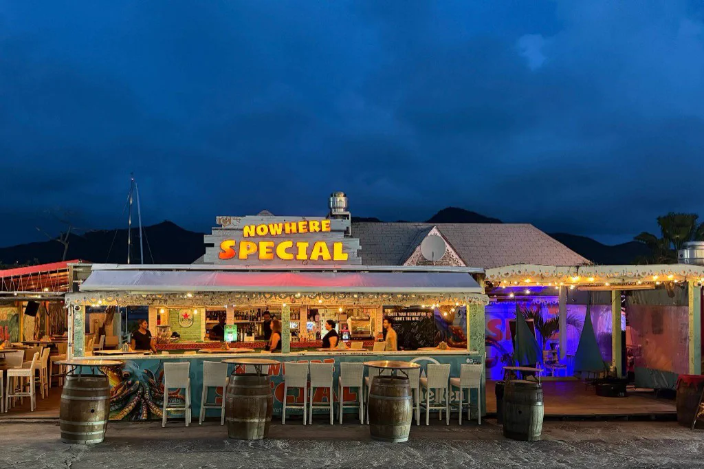 Nowhere Special in Simpson Bay - illuminated sign and outdoor terrace at night