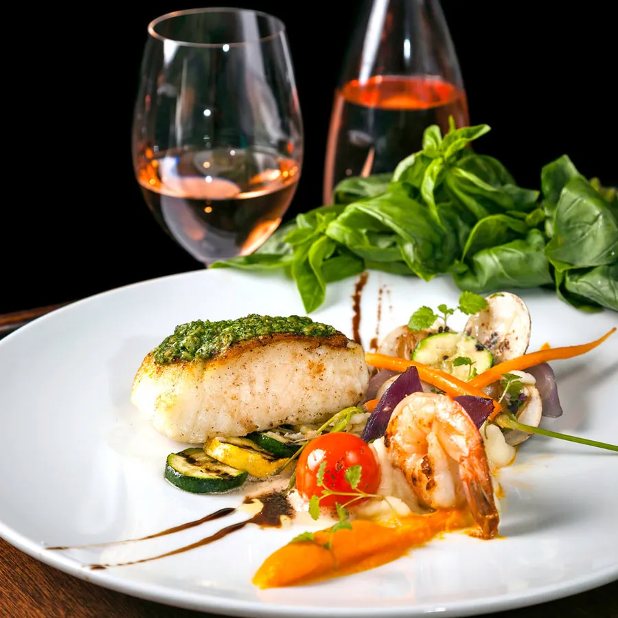 Ocean Lounge - contemporary plate with fish, shrimp and rose wine