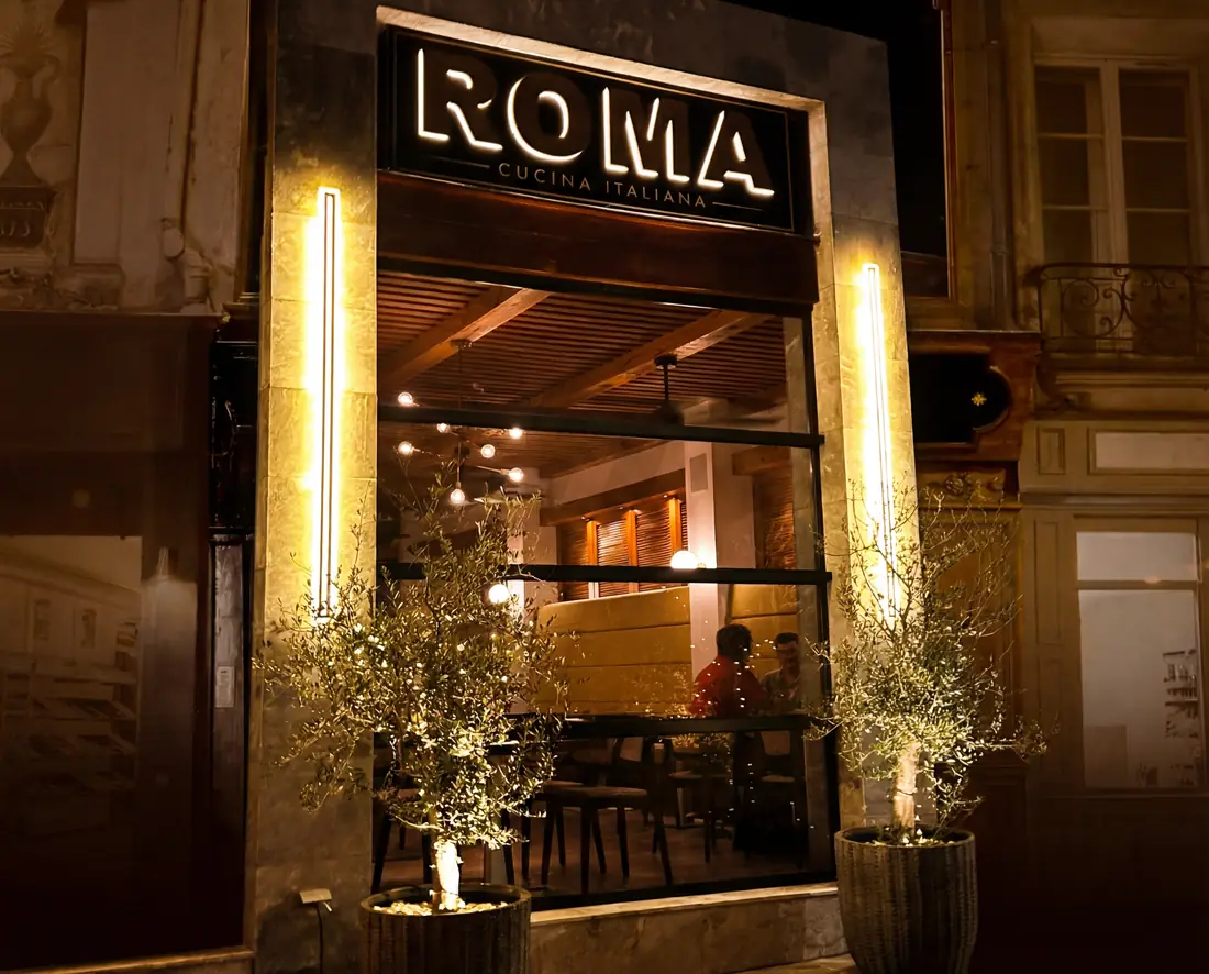 Roma Restaurant - Illuminated facade of the Italian restaurant in Maho Village