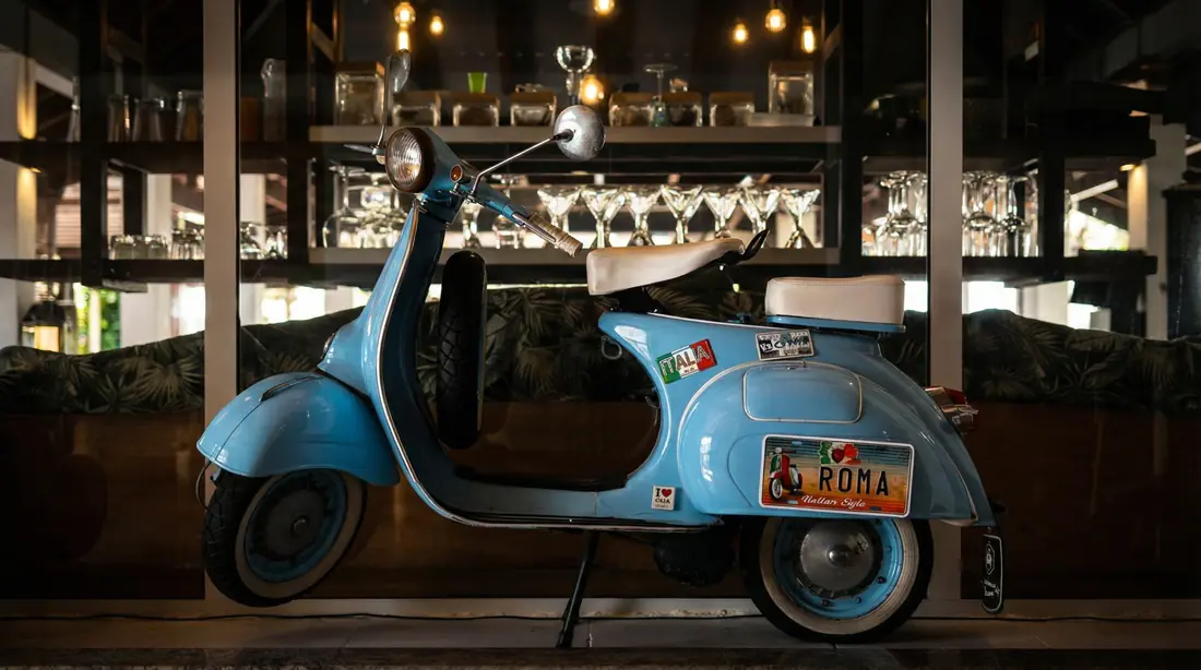 Roma Restaurant - Italian decor and Vespa scooter in the dining room