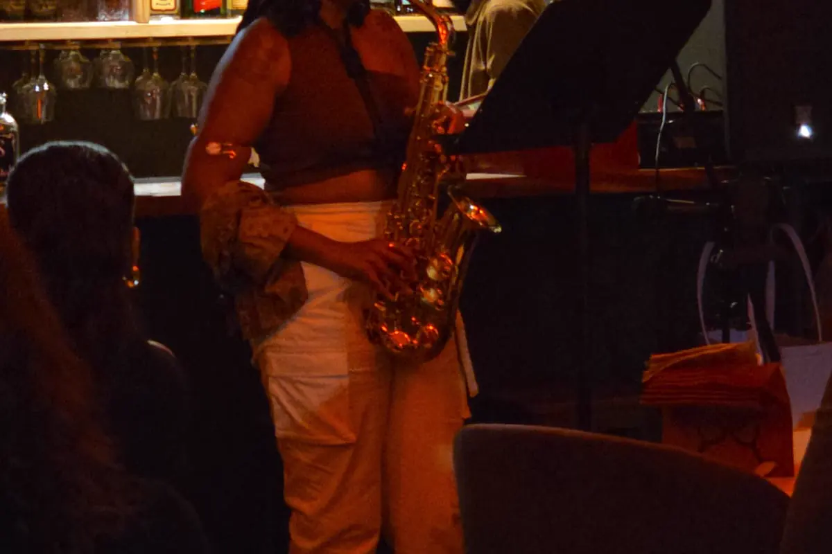 Saxophone player performing live at The Jazz Spot in Marigot