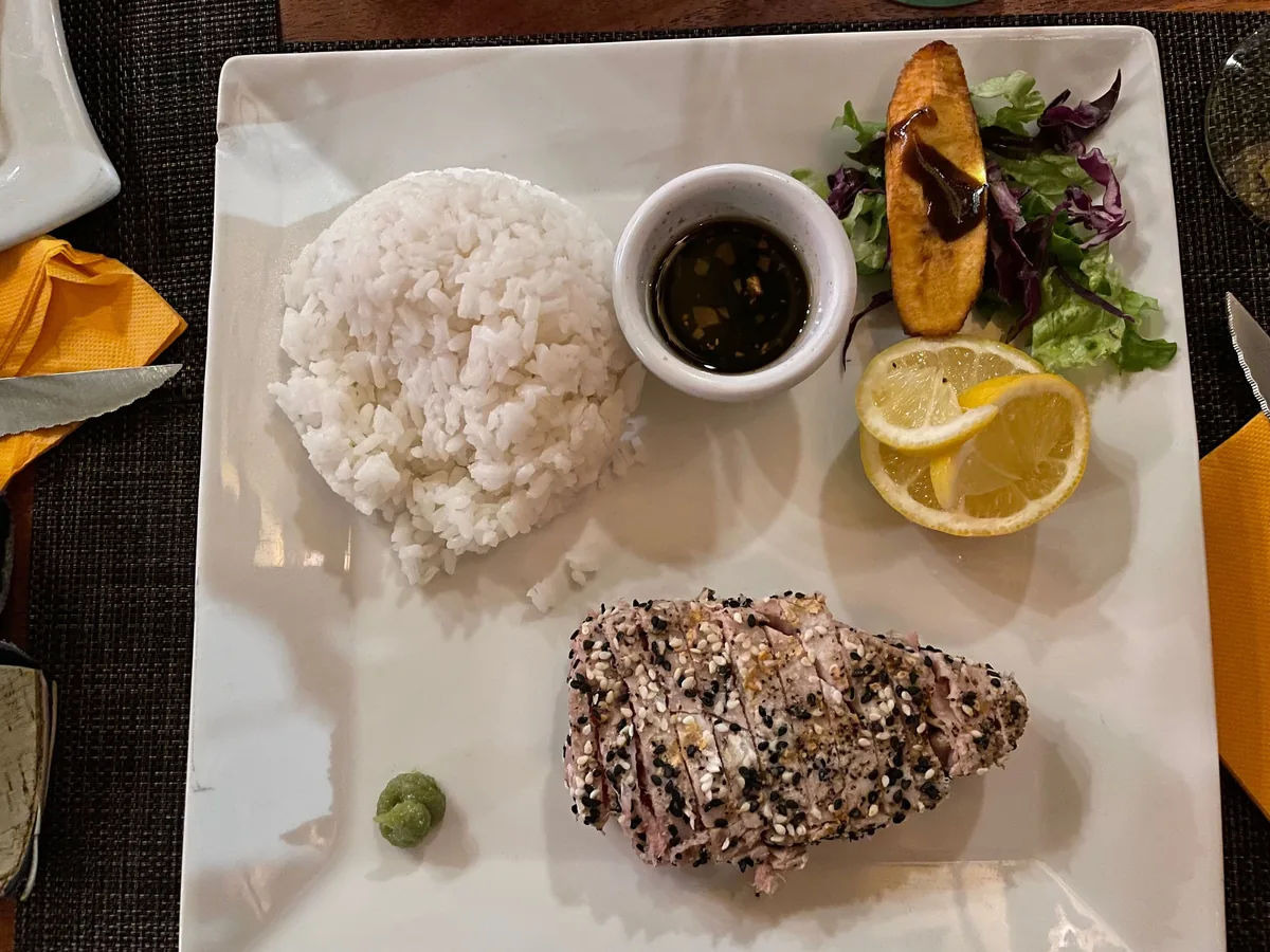 Seared sesame tuna served with white rice and ginger soy at The Palms