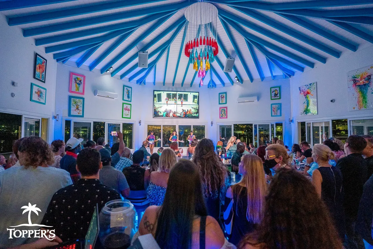 Karaoke night and Broadway show at Topper's bar in Cole Bay