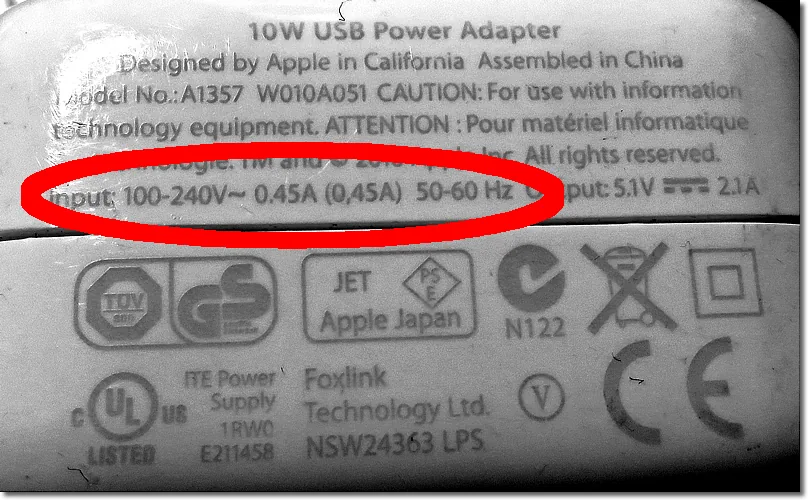 Charger label with "Input 100-240V" circled in red