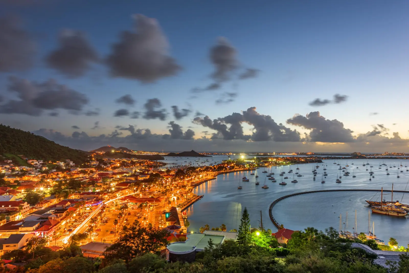 Marigot at dusk, with the town lights and sailboats in the bay