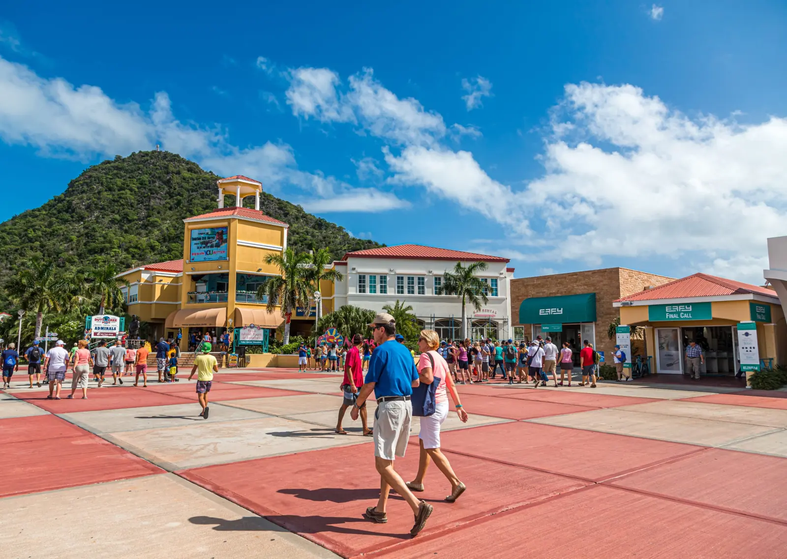 Visitors walking through the shopping area of the Philipsburg cruise port