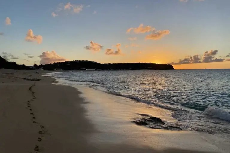 Golden sand and turquoise water at Baie Rouge