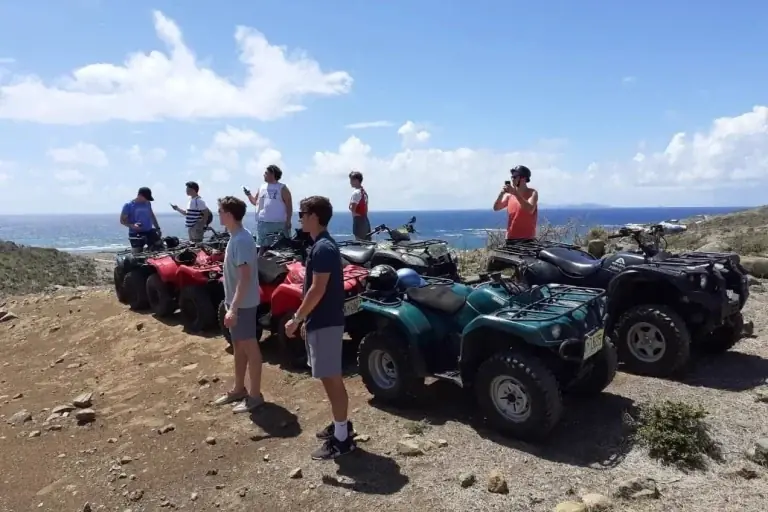 ATV Island group with quads at a panoramic viewpoint