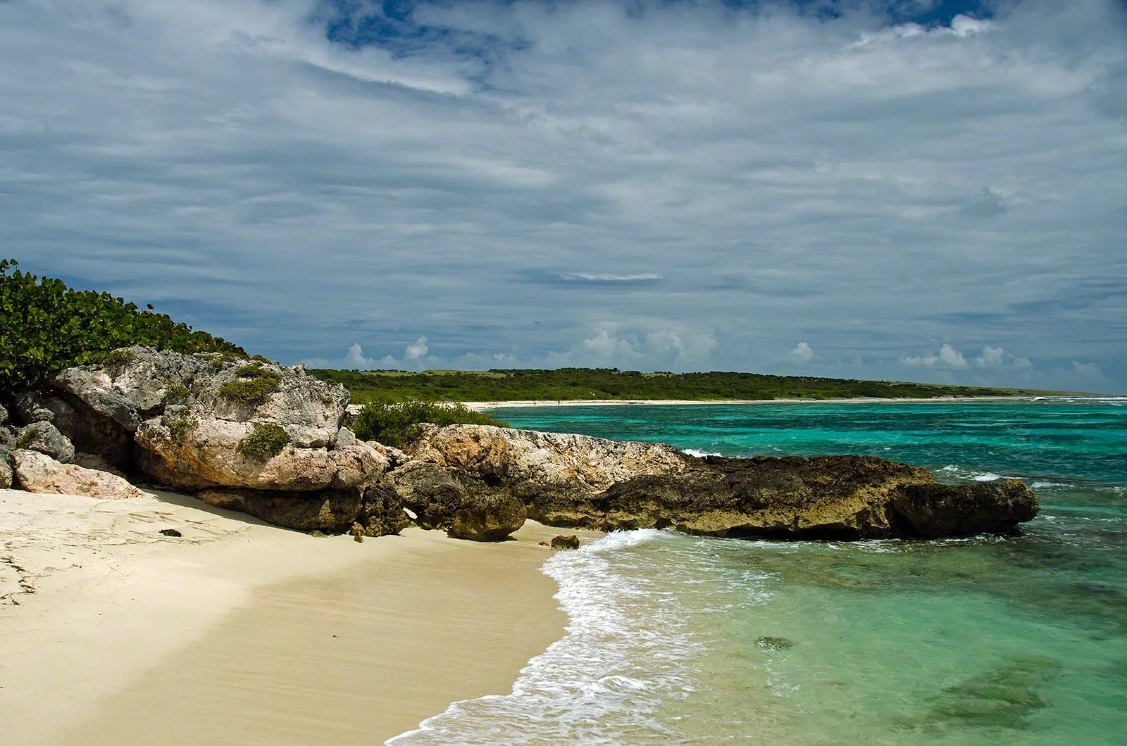 Turquoise coral lagoon on the east coast of Tintamarre, Saint Martin Nature Reserve