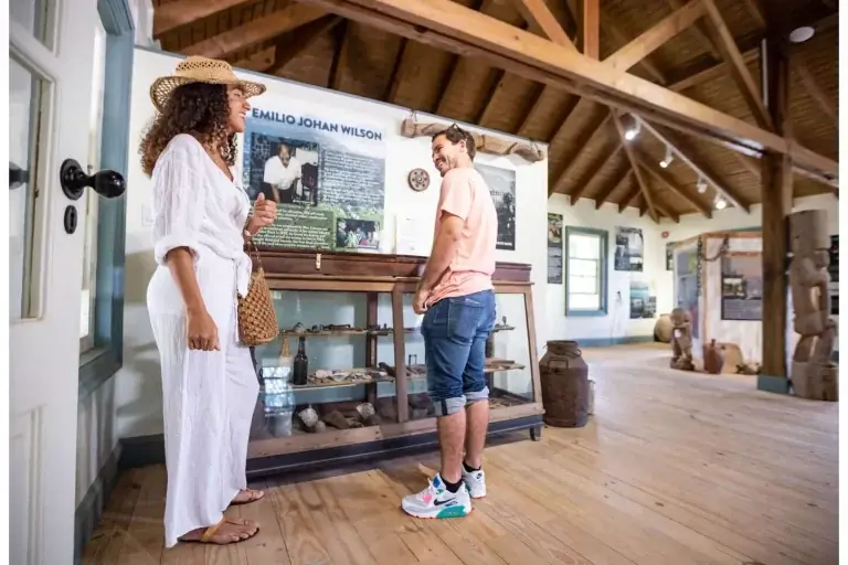 Visitors inside the Emilio Wilson Museum at Rockland Estate